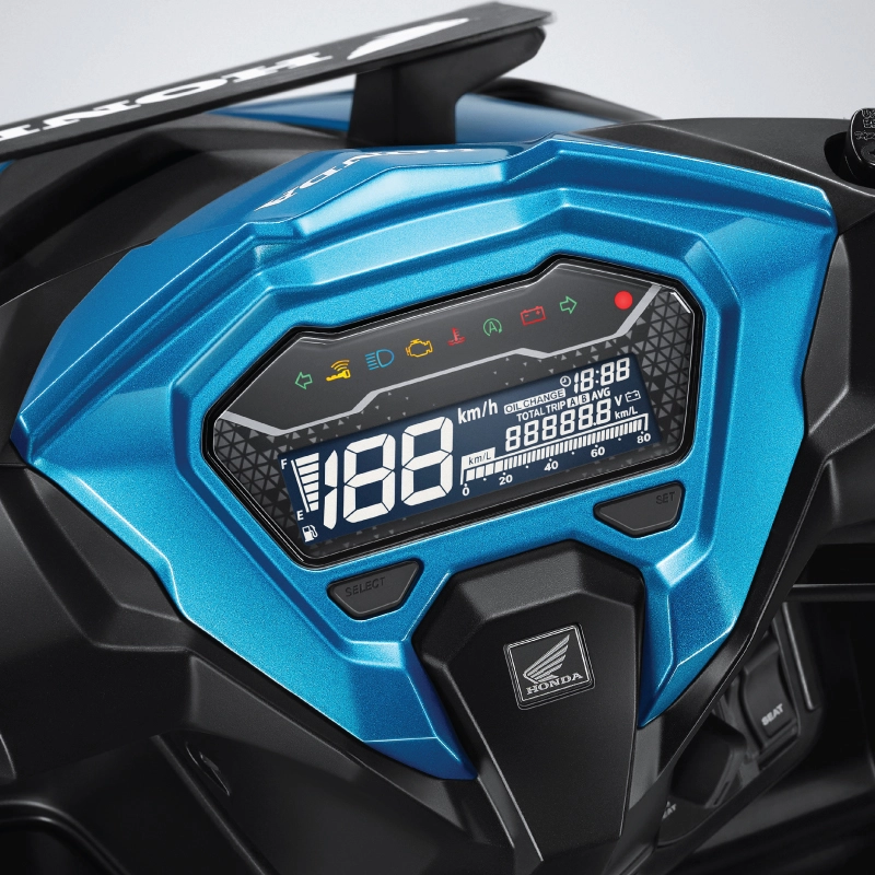 Full Digital Panel Meter memuat informasi konsumsi bahan bakar, jam digital, speedometer, tripmeter, pergantian oli, indikator baterai & tegangan aki